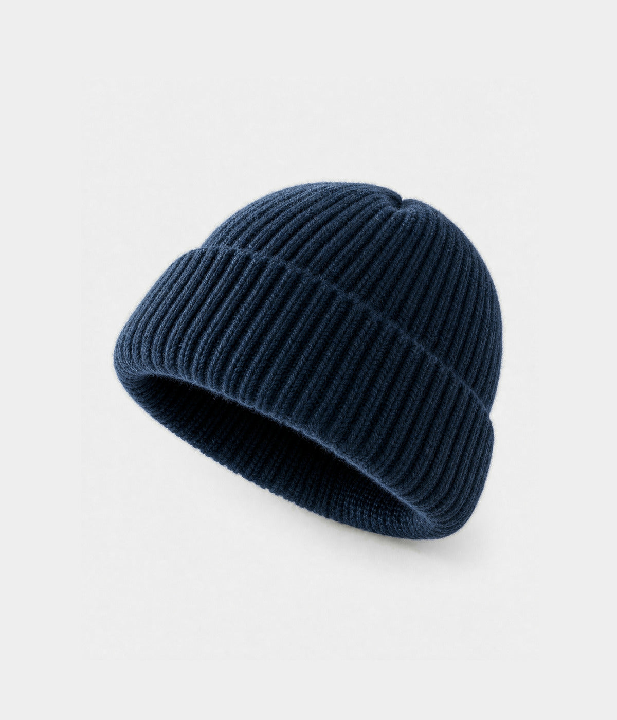5 PANEL FISHERMAN BEANIE. ribbed knit beanie in NAVY, front view