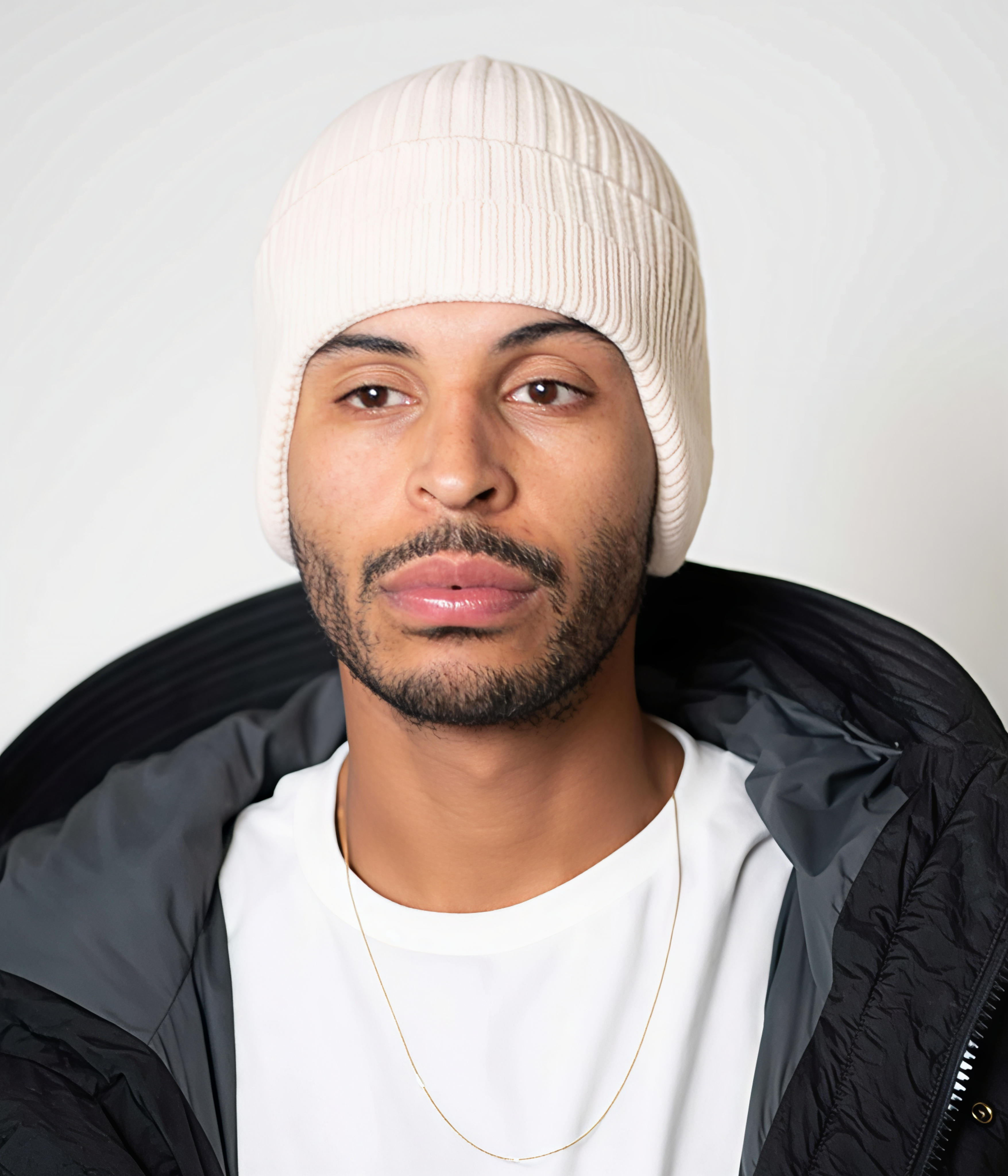 CABLE EARMUFF BEANIE.