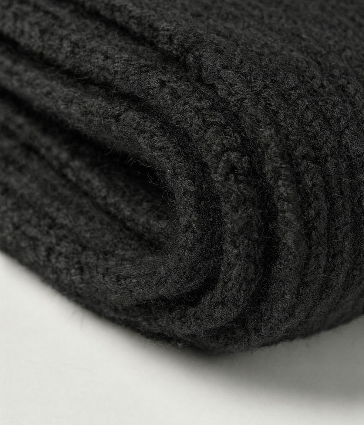 CLASSIC SCARF. knit scarf in BLACK, soft knit texture close-up