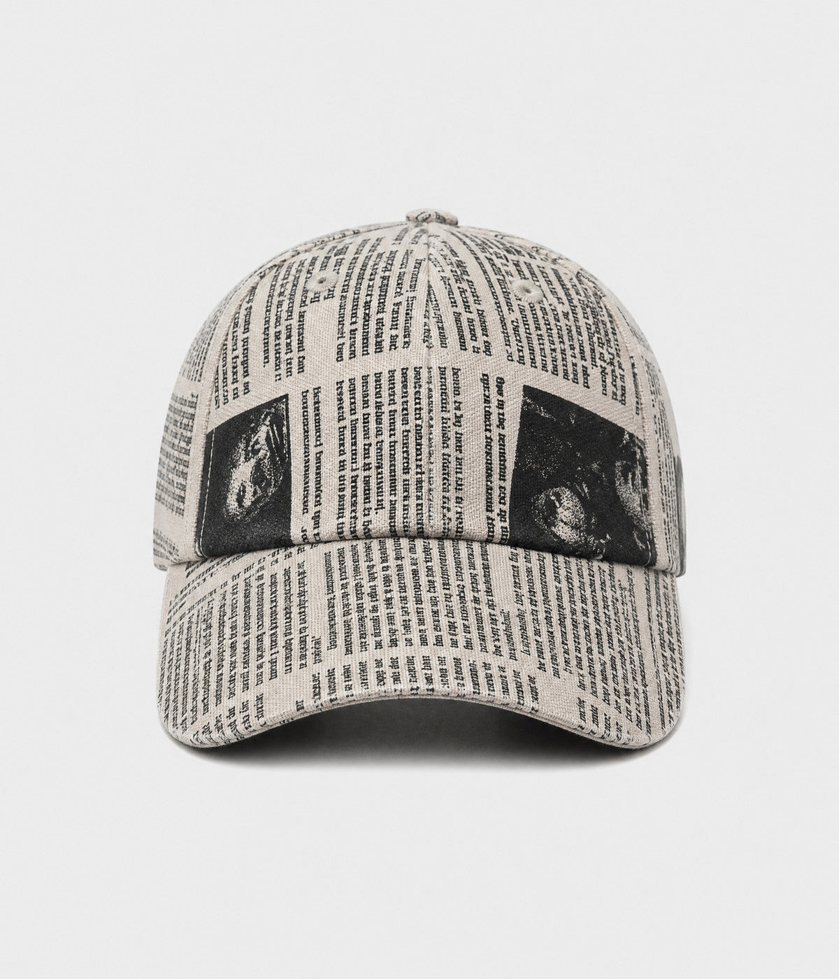 NEWSPRINT. cotton twill newsprint-print cap in beige, front view