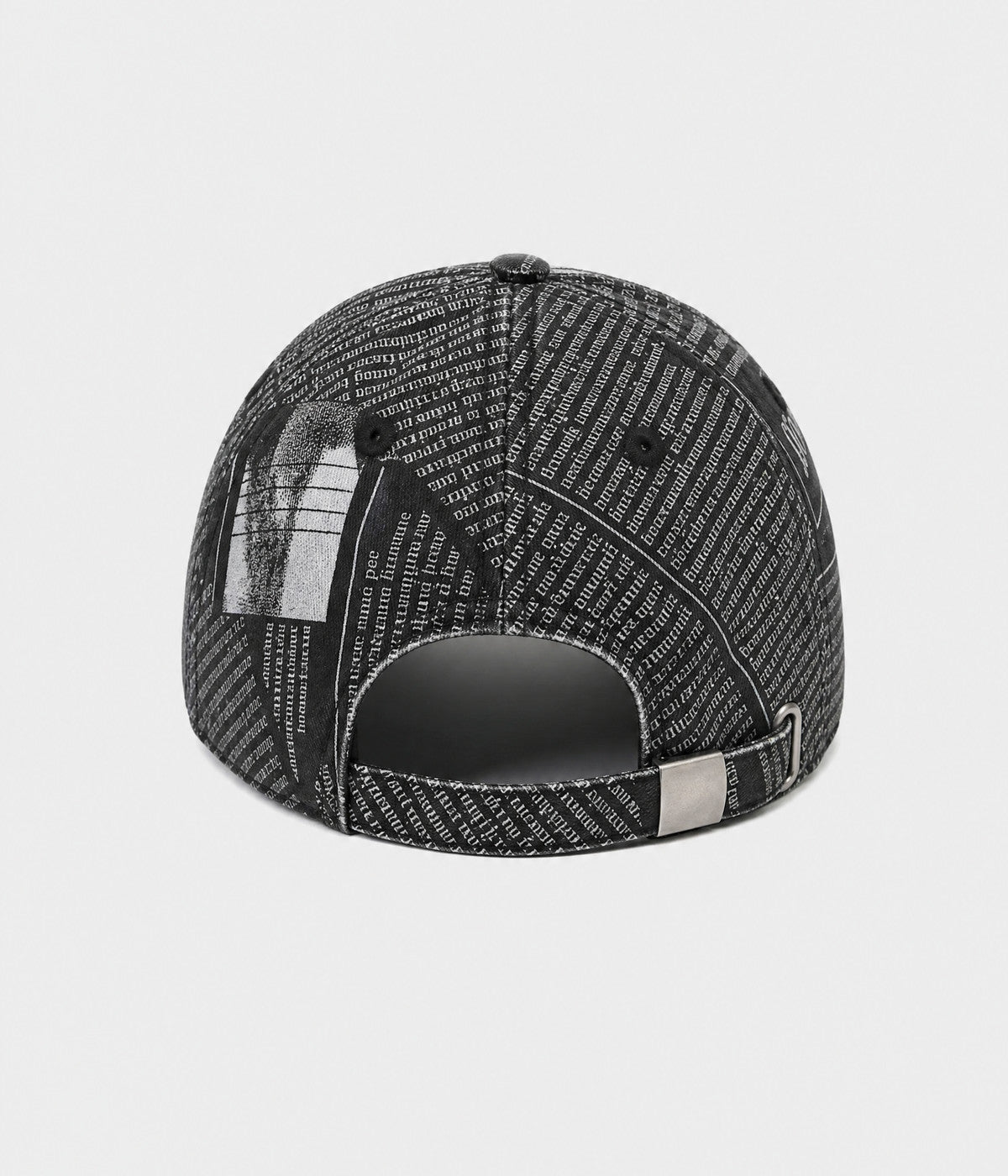 NEWSPRINT. cotton twill newsprint-print cap in black, back view