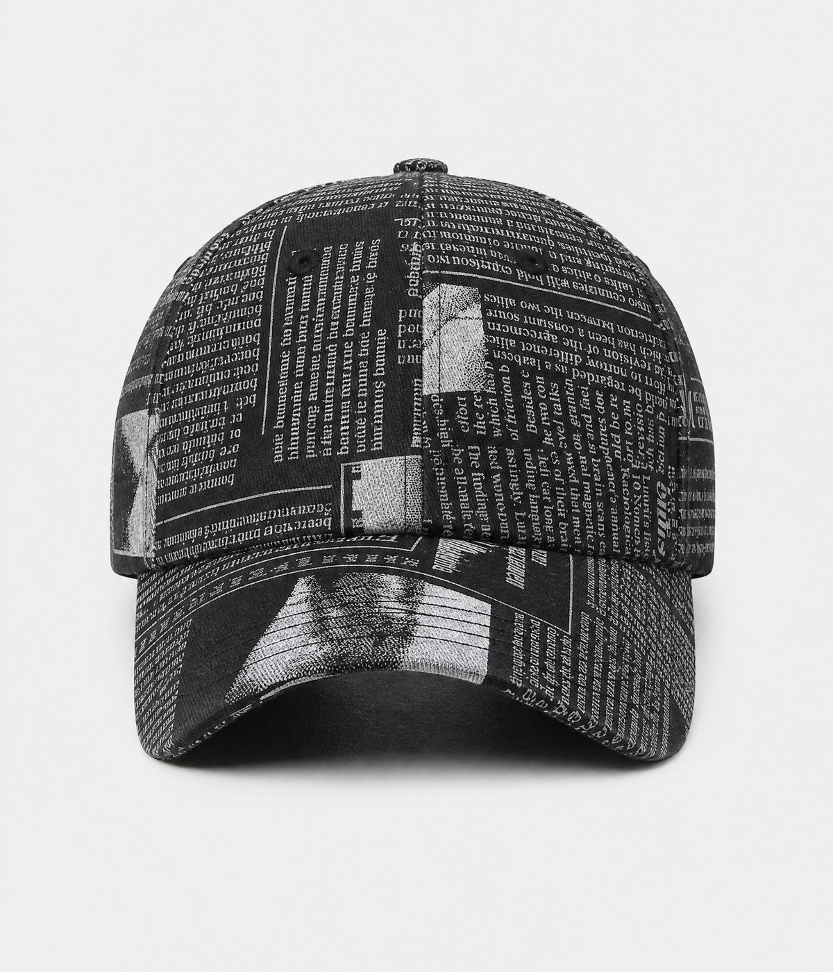 NEWSPRINT. cotton twill newsprint-print cap in black, front view