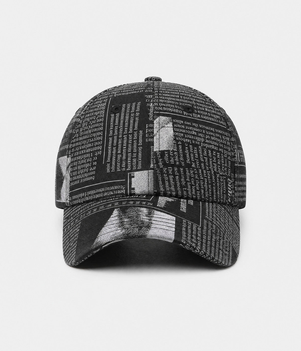 NEWSPRINT. cotton twill newsprint-print cap in black, front view