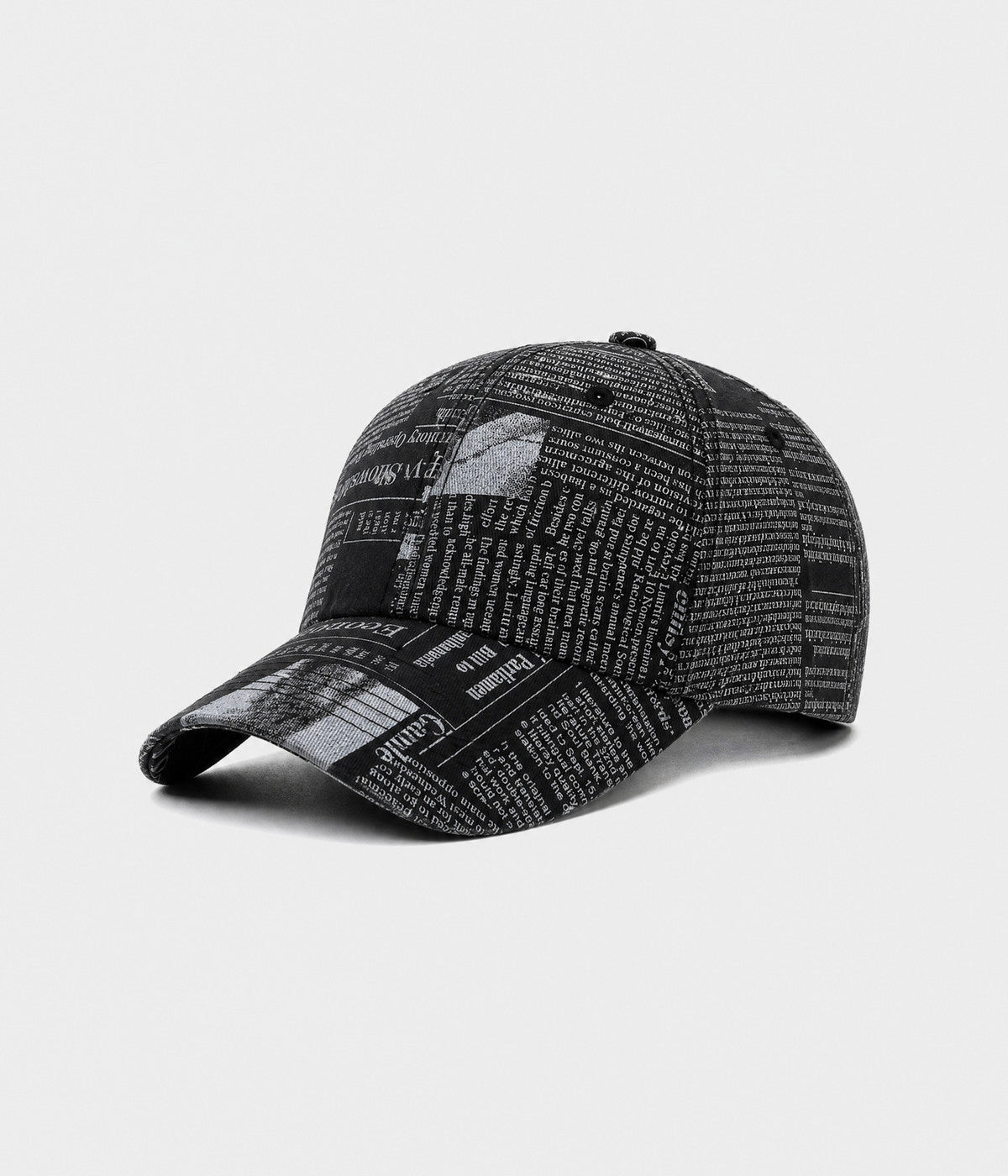 NEWSPRINT. cotton twill newsprint-print cap in black, side view
