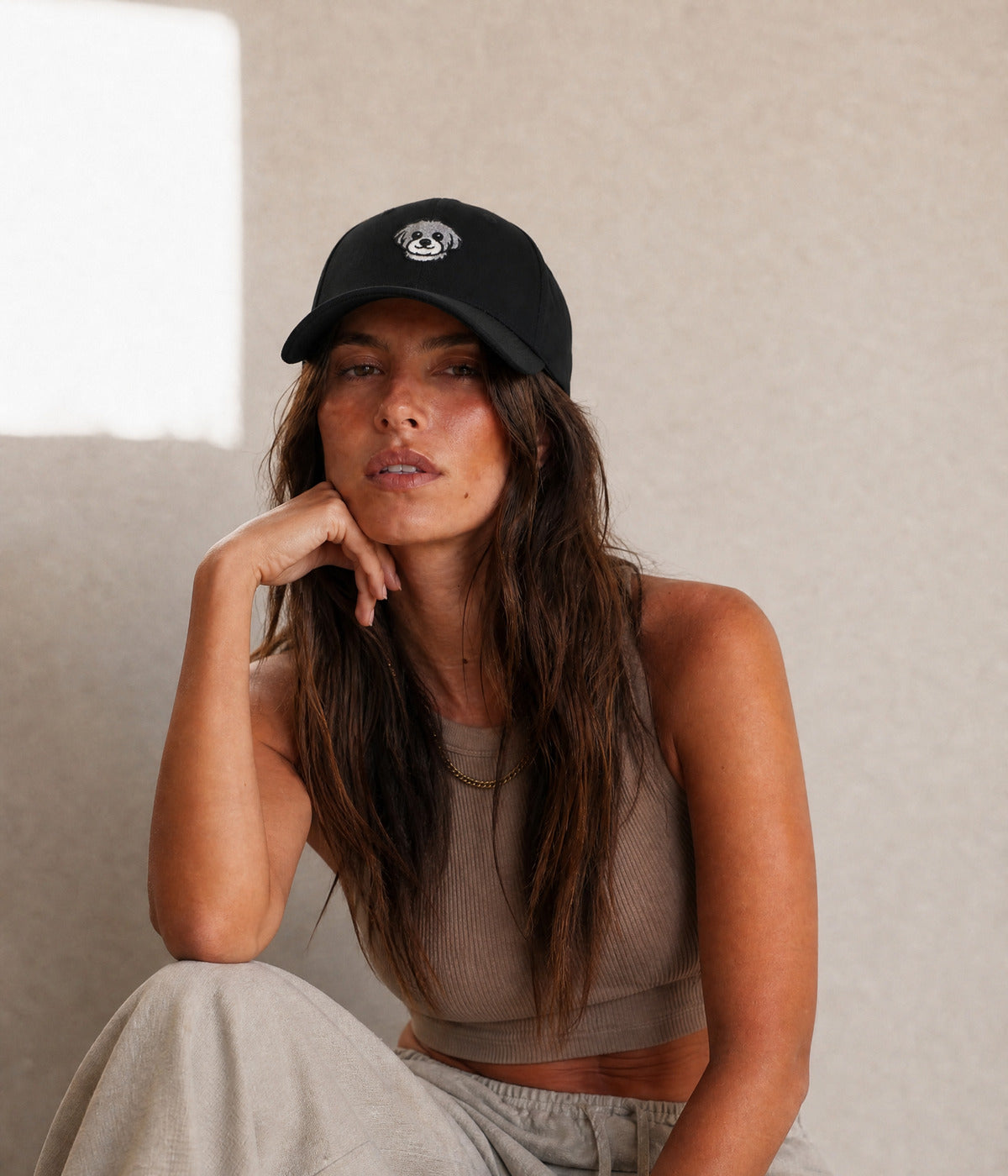 BUBU RESCUE CAP. (All profits donated) BLACK worn by a woman