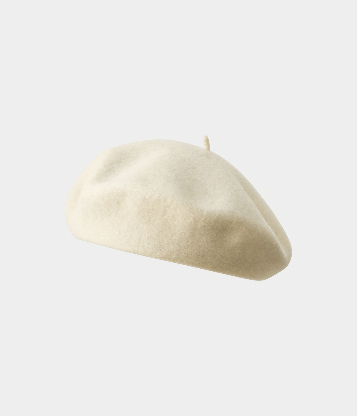 CLASSIC BERET. felt beret in cream, front view