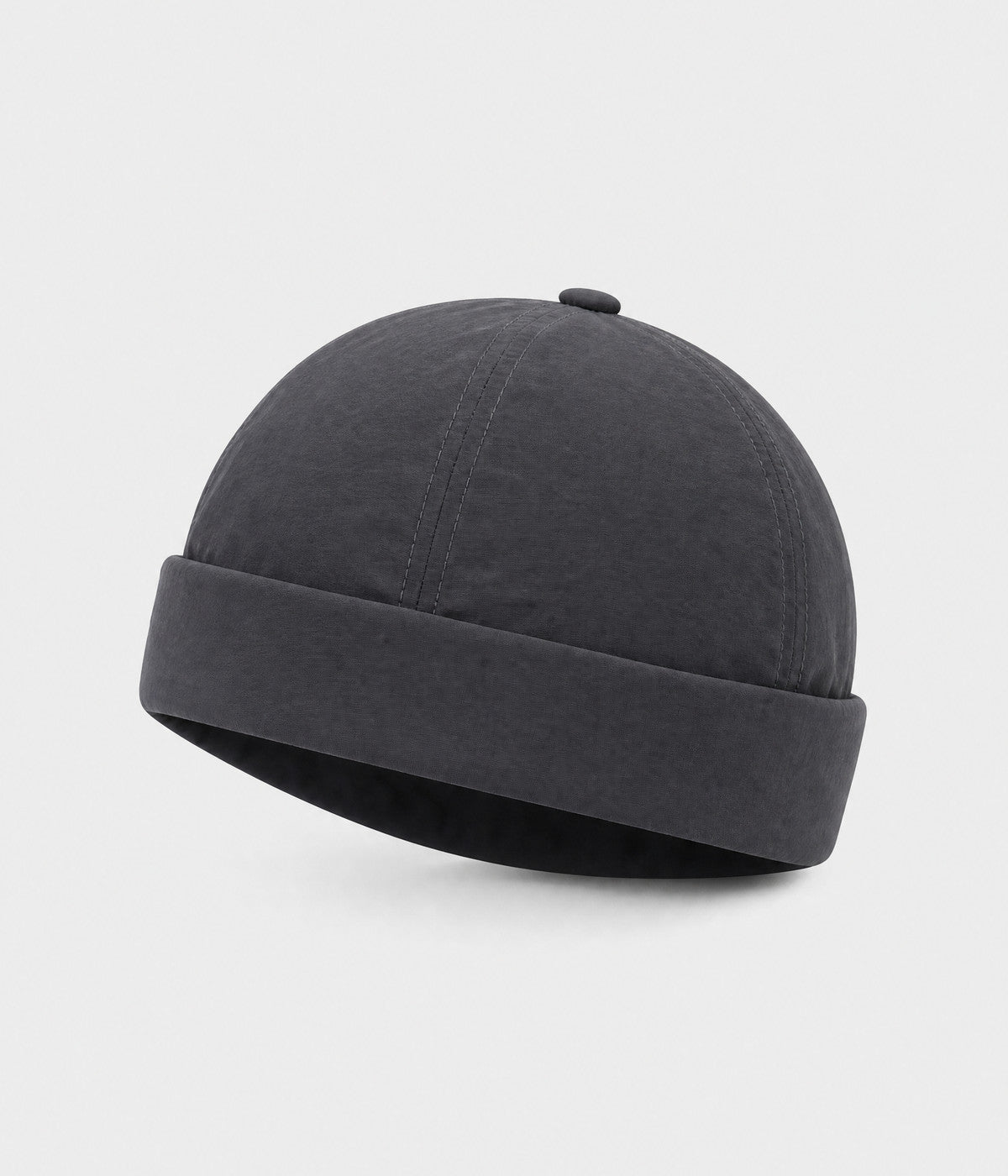 QUICK DRY DOCKER. quick-dry brimless docker cap in dark gray, front view