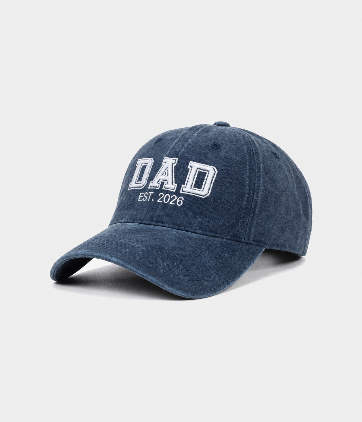 WASHED DAD EST 2026. washed cotton dad cap in NAVY, side view