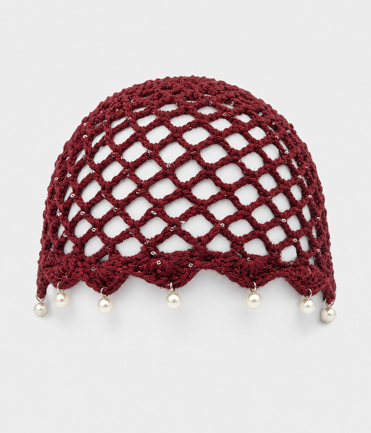 PEARL CROCHET CAP. open-mesh crochet cloche with pearl trim in red, front view