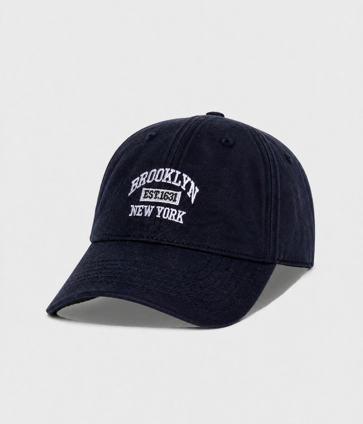 BROOKLYN NY. washed cotton dad cap in navy, side view