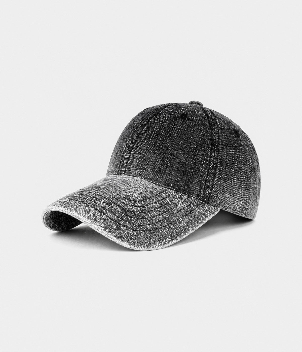 DENIM FADE. washed cotton cap in black, side view