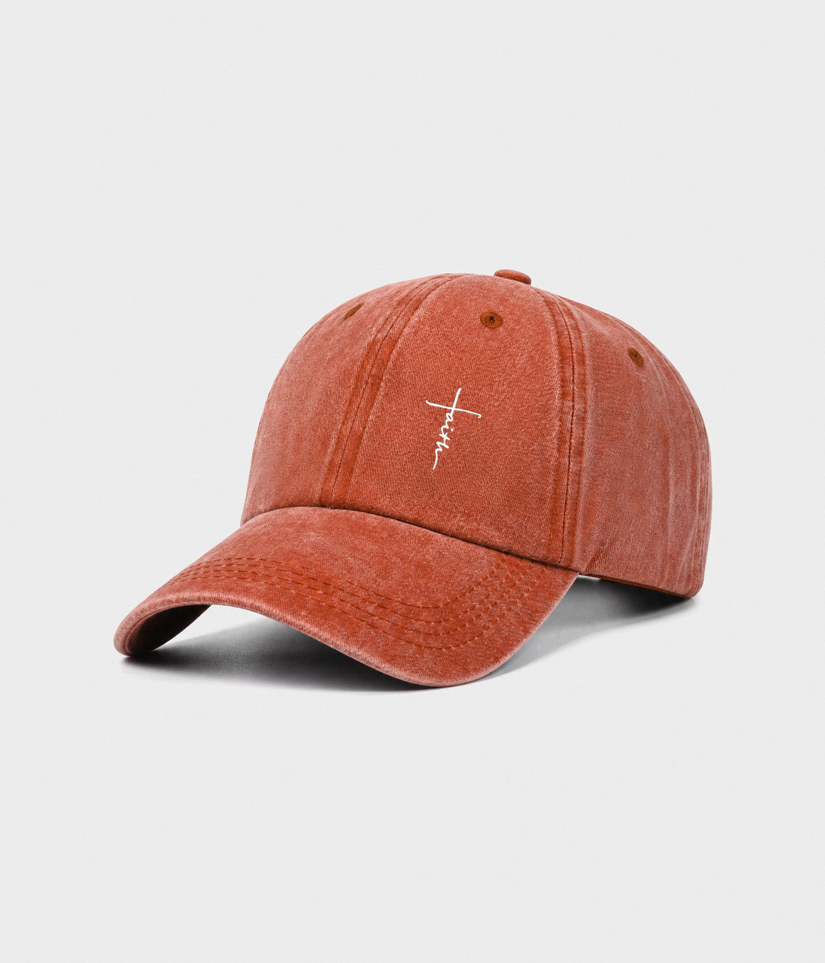 FAITH CROSS. washed cotton cap in RUST, side view