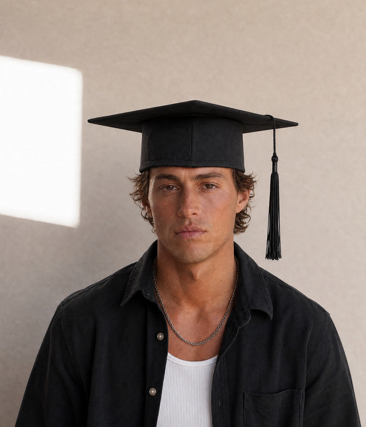 GRADUATION CAP. — BLACK worn
