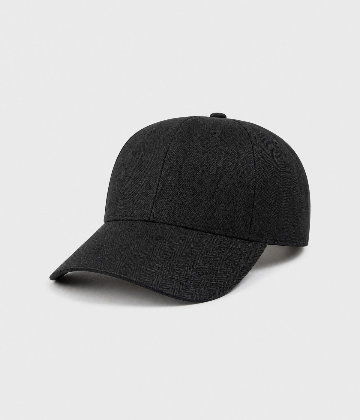 HERRINGBONE LINEN CAP. herringbone linen cap in black, side view