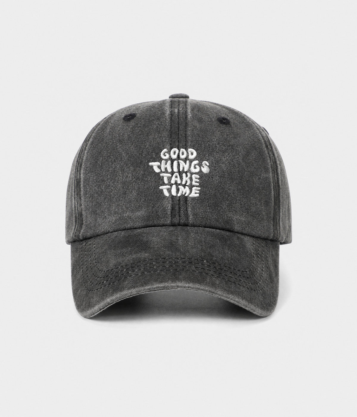 GOOD THINGS TAKE TIME. washed cotton dad cap in black, front view