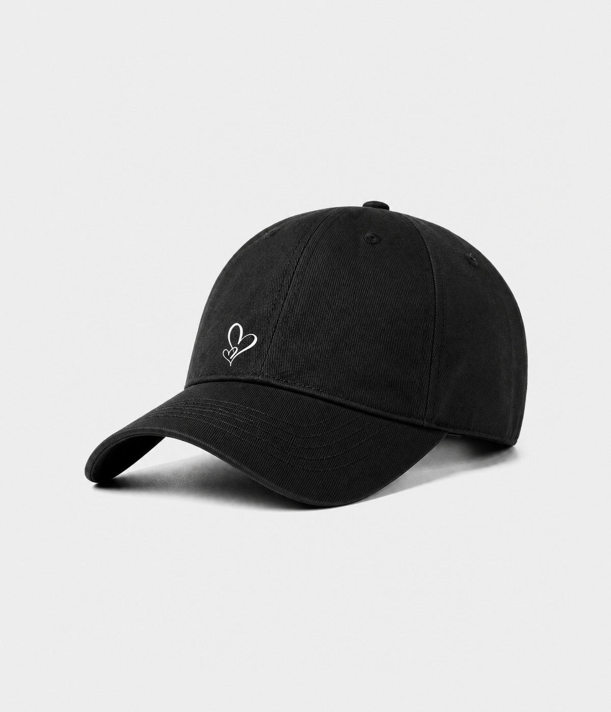 TWO HEARTS. cotton dad cap in black, side view