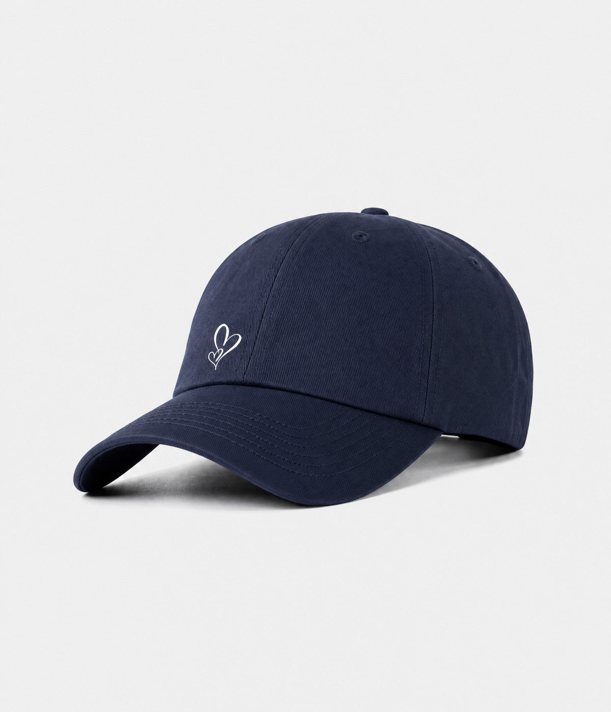 TWO HEARTS. cotton dad cap in navy, side view