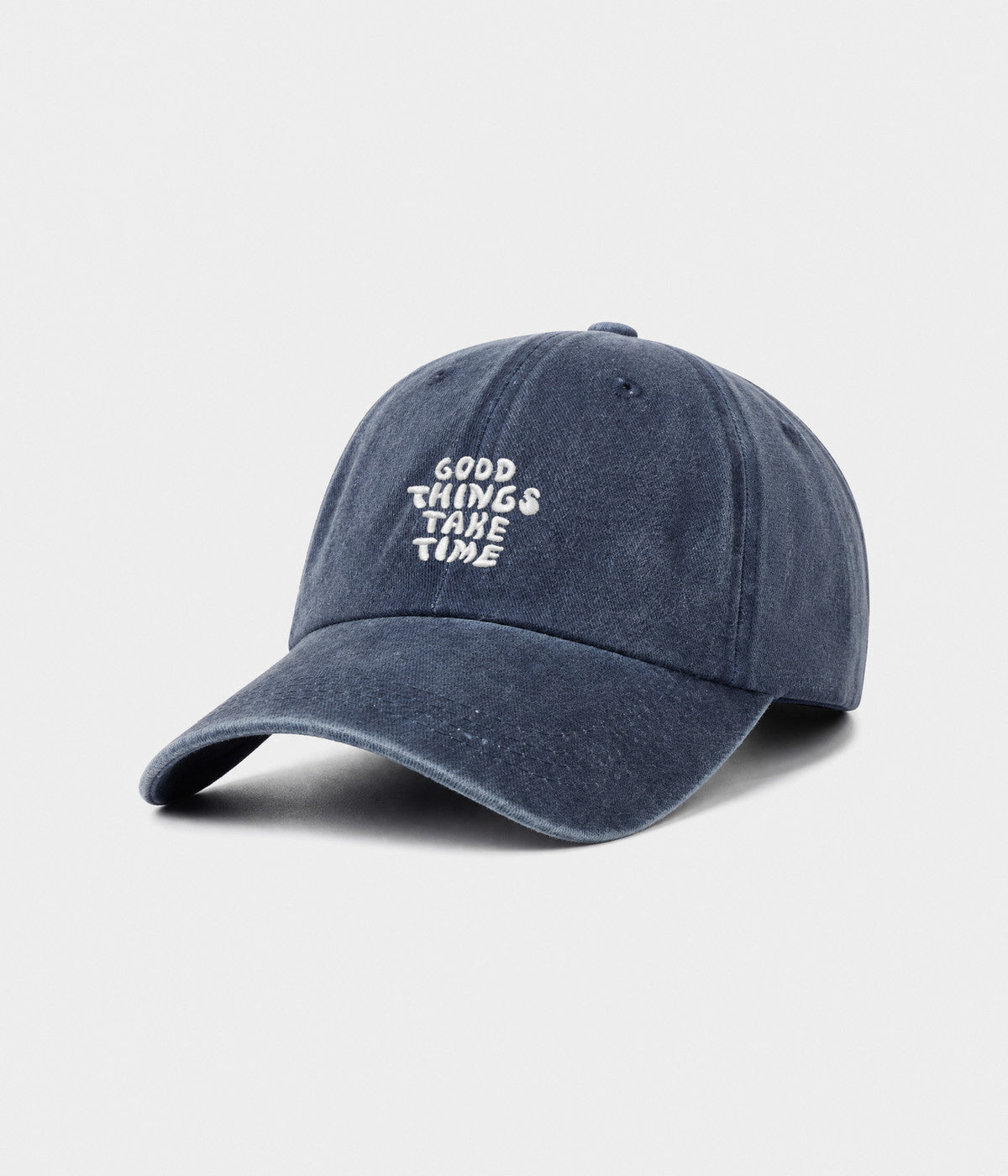 GOOD THINGS TAKE TIME. washed cotton dad cap in navy, side view