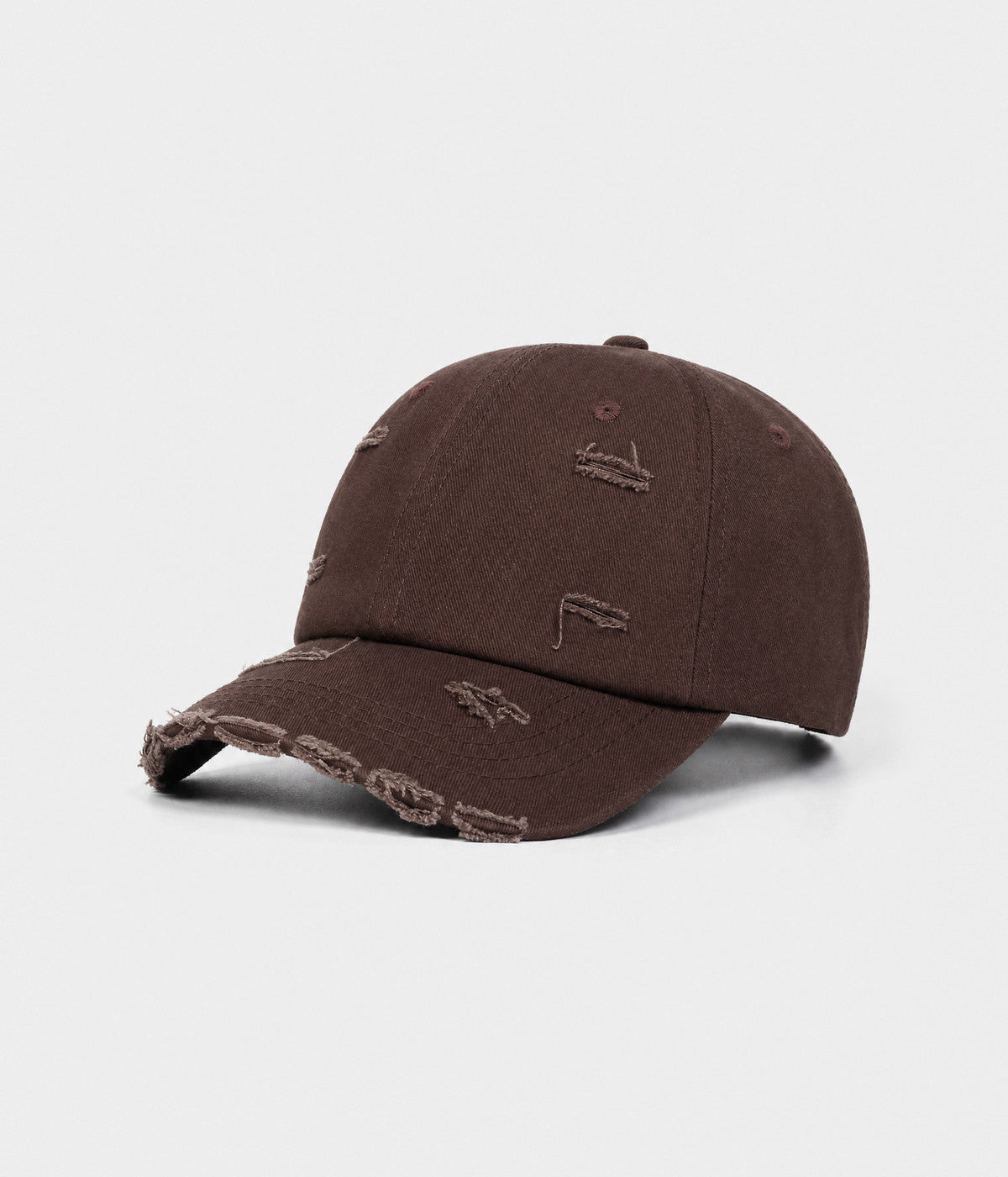 RIPPED COTTON. distressed cotton cap in brown, side view