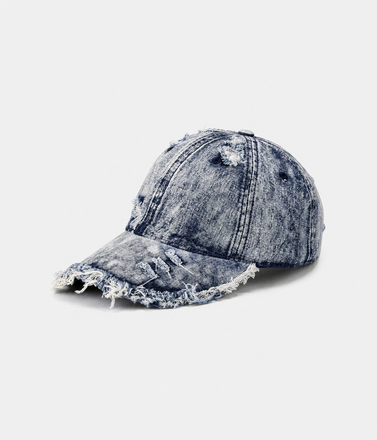 SHREDDED DENIM. acid-wash cotton denim cap in blue, side view