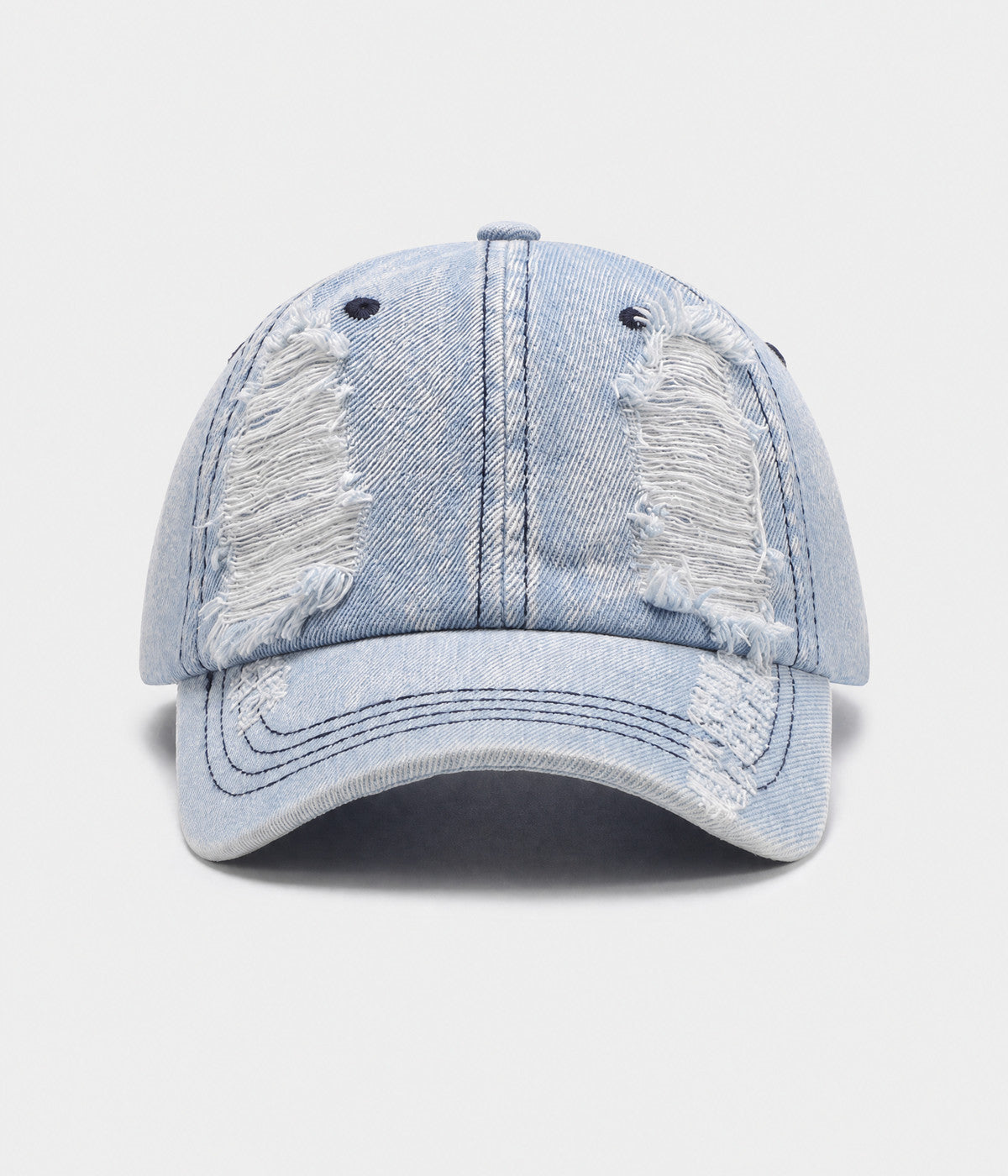 TORN DENIM. washed cotton denim cap in light blue, front view