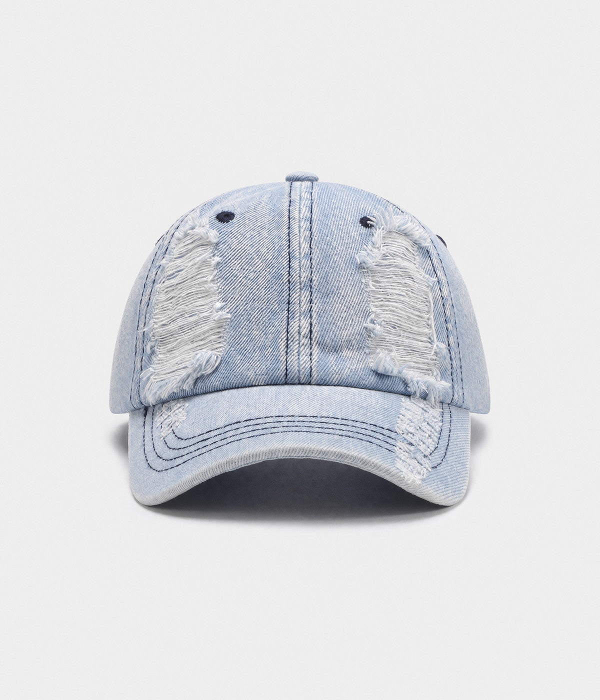 TORN DENIM. washed cotton denim cap in light blue, front view