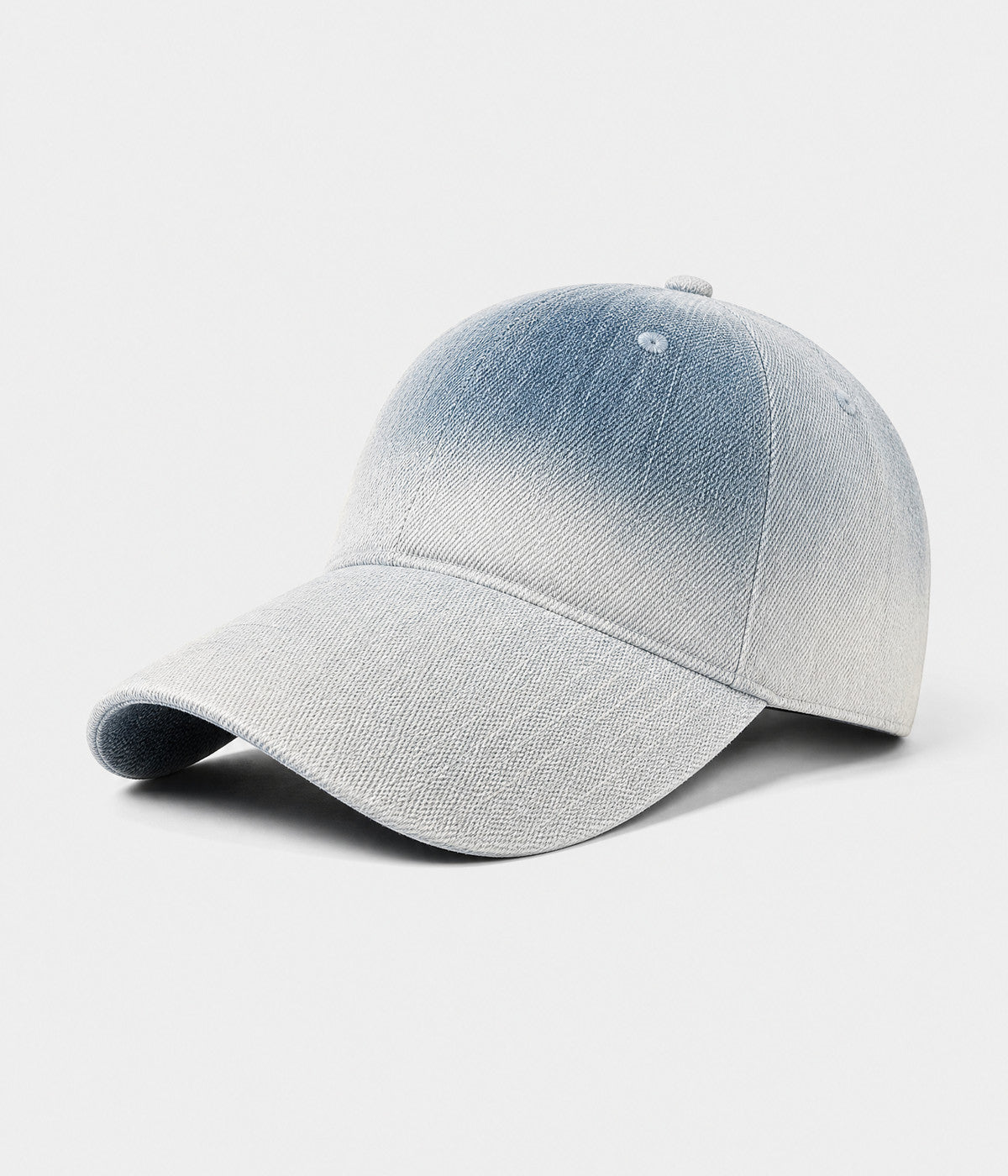 DENIM FADE. washed cotton cap in light blue, side view