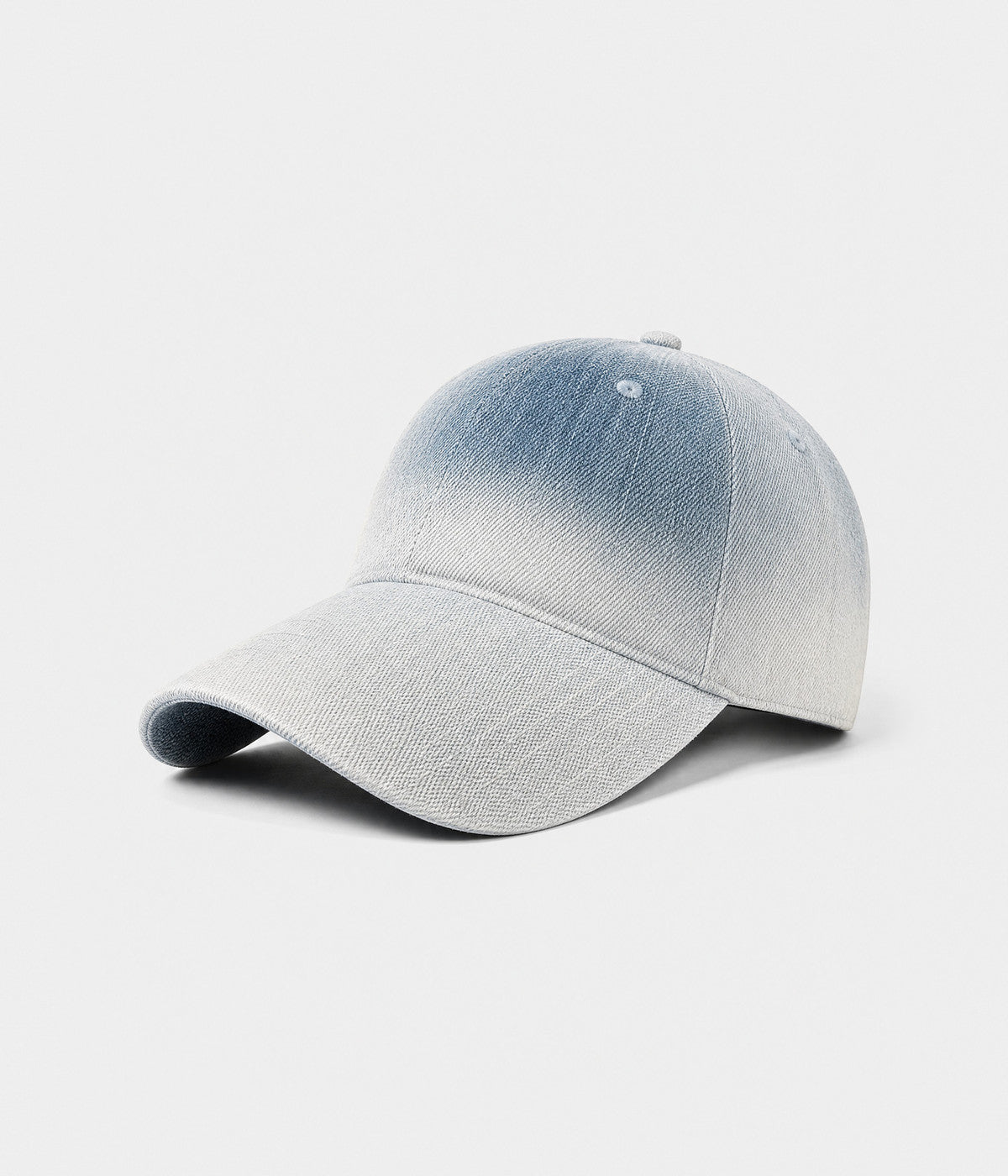 DENIM FADE. washed cotton cap in light blue, side view