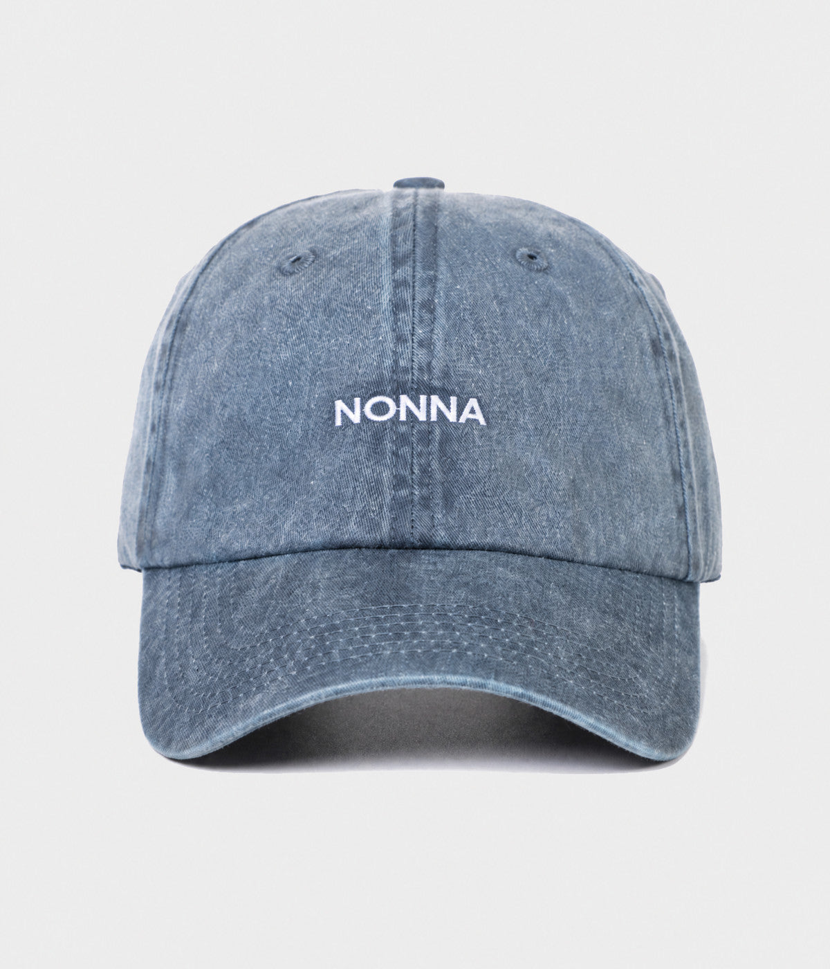 WASHED NONNA. washed cotton dad cap in NAVY, front view