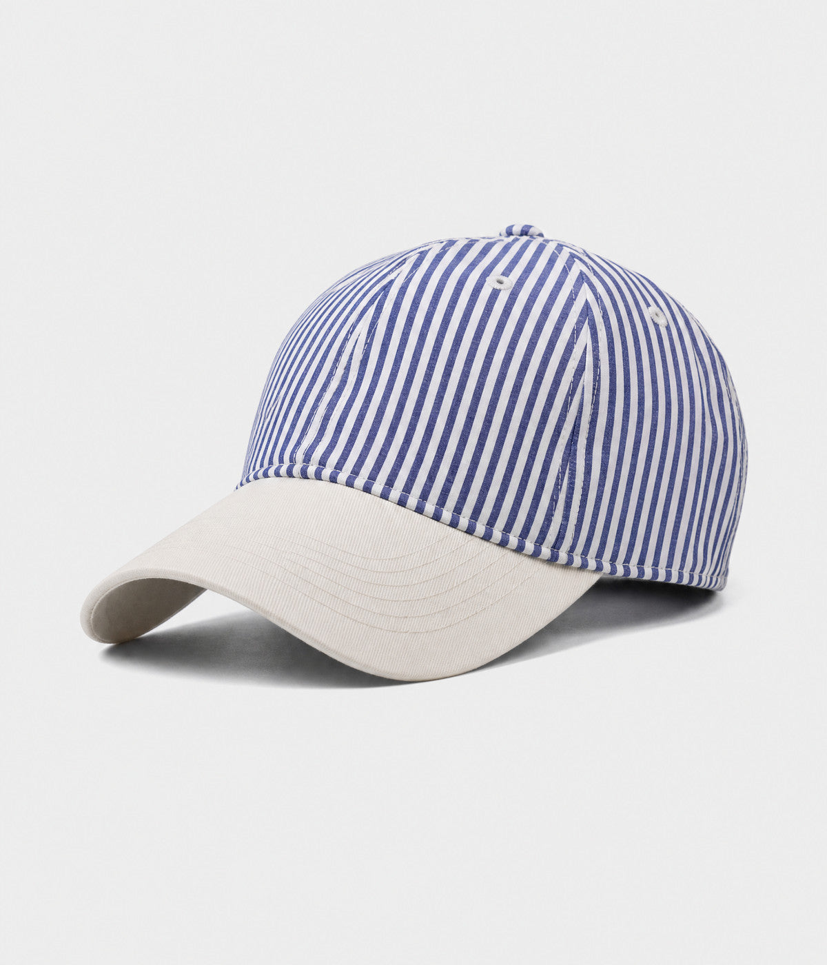 CANDY STRIPE. striped unstructured cap in NAVY, side view