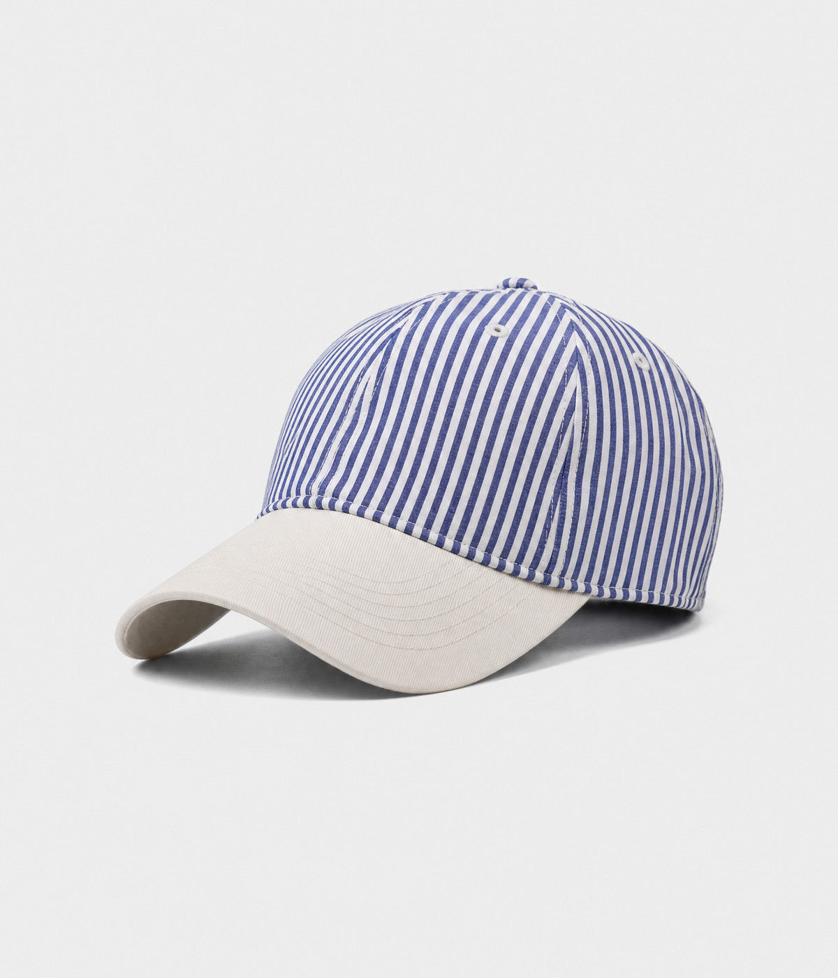 CANDY STRIPE. striped unstructured cap in NAVY, side view
