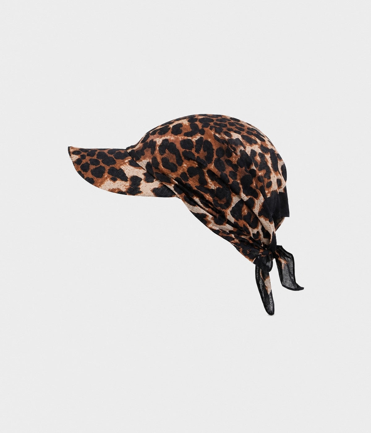 PEAKED BANDANA CAP. peaked bandana cap in leopard print, front view