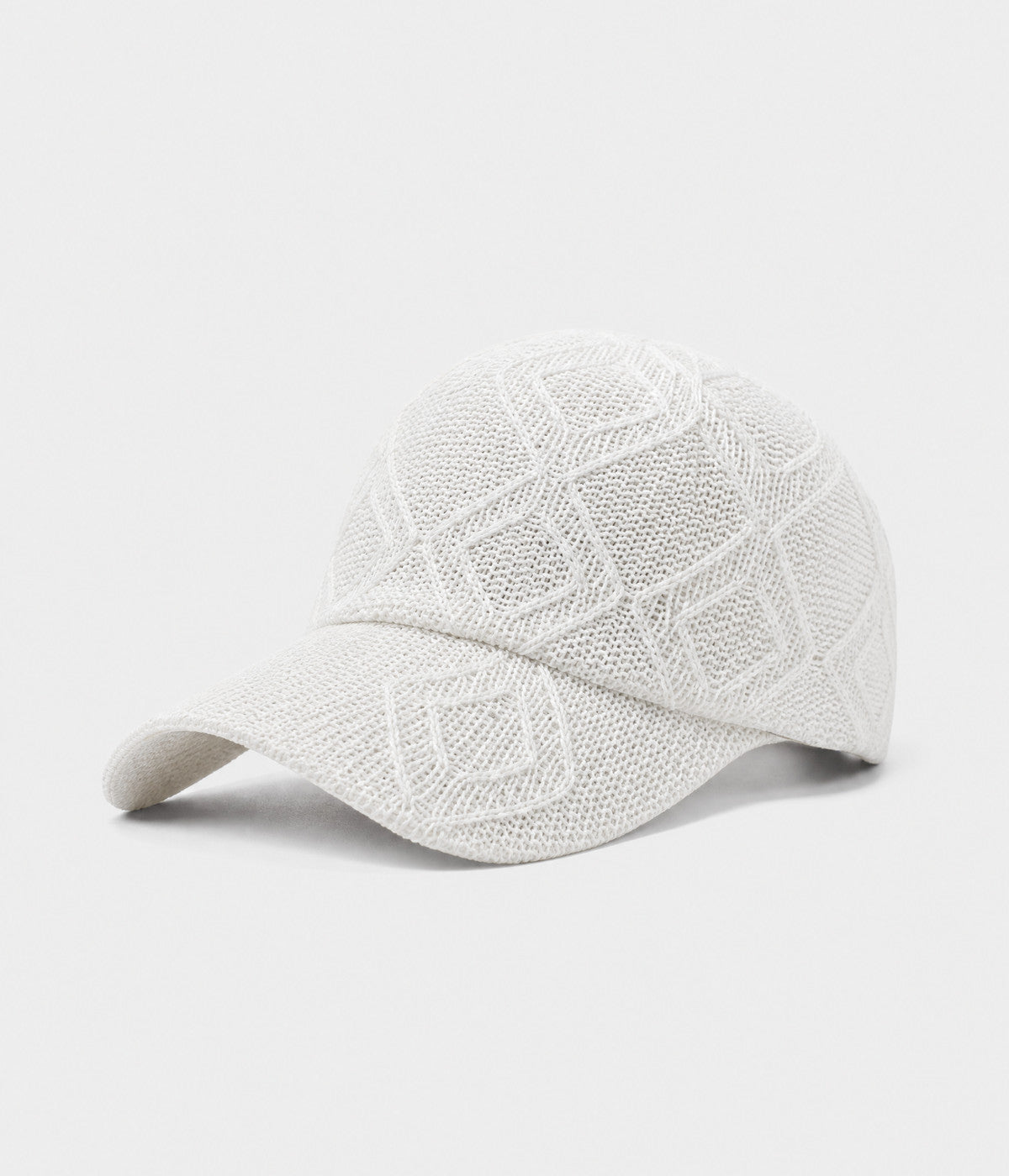 OPEN KNIT. open-knit lattice cap in white, side view
