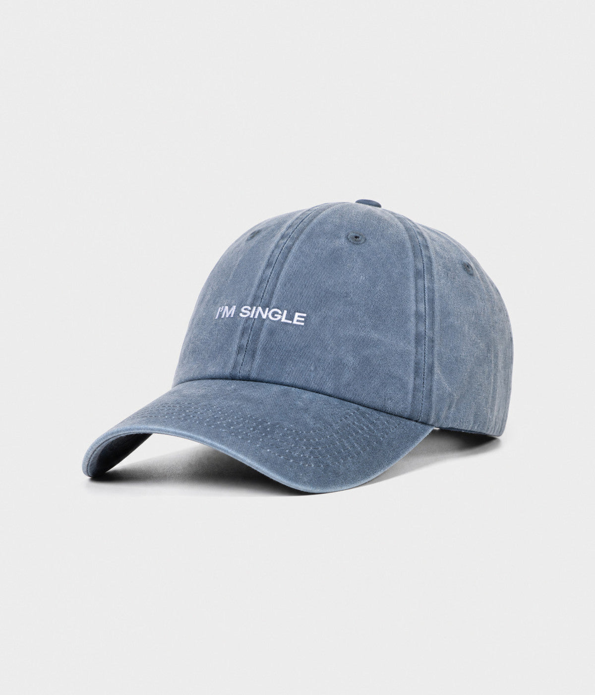 WASHED I'M SINGLE. washed cotton dad cap in NAVY, side view