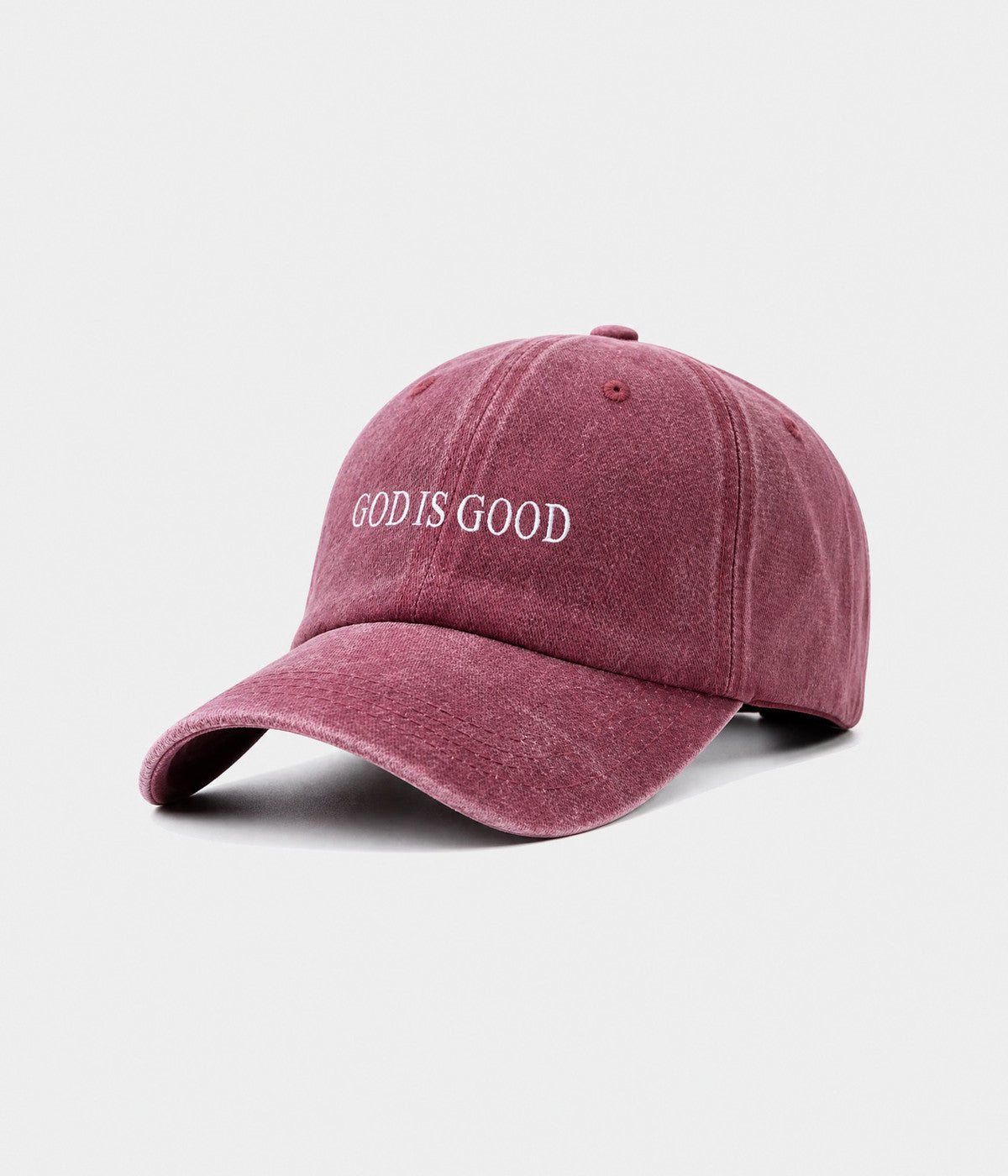 GOD IS GOOD. washed cotton cap in burgundy, side view