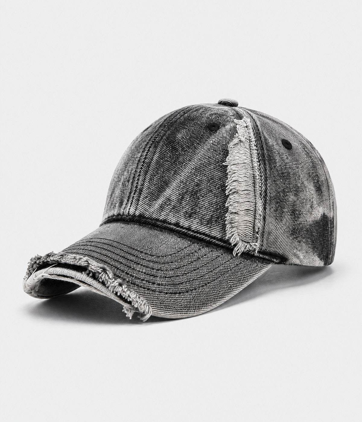 SNOW WASH DENIM. acid-washed denim cap in black, side view