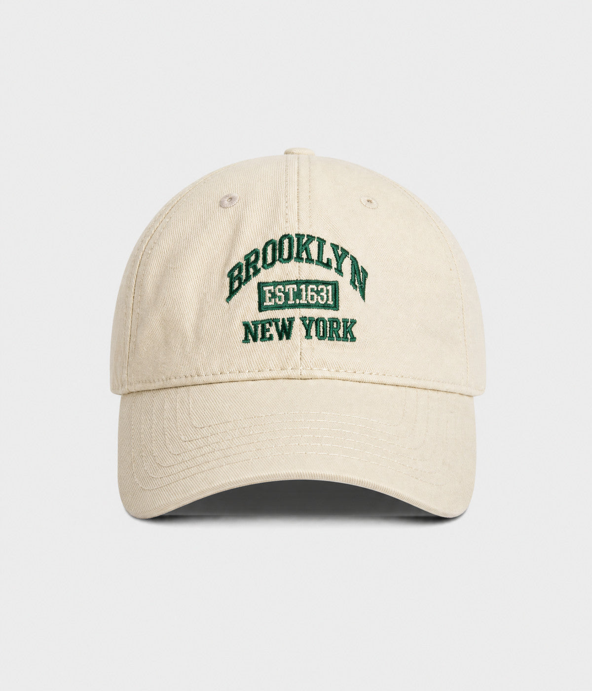 BROOKLYN NY. washed cotton dad cap in cream, front view