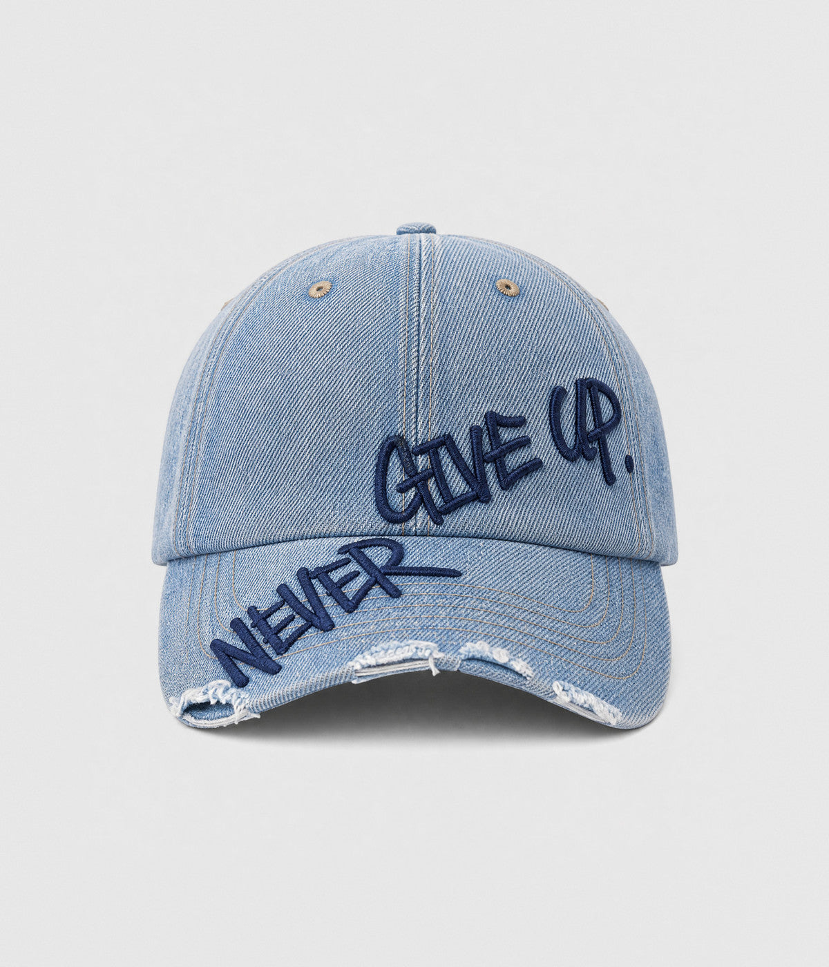 NEVER GIVE UP. washed distressed cotton dad cap in DENIM, front view