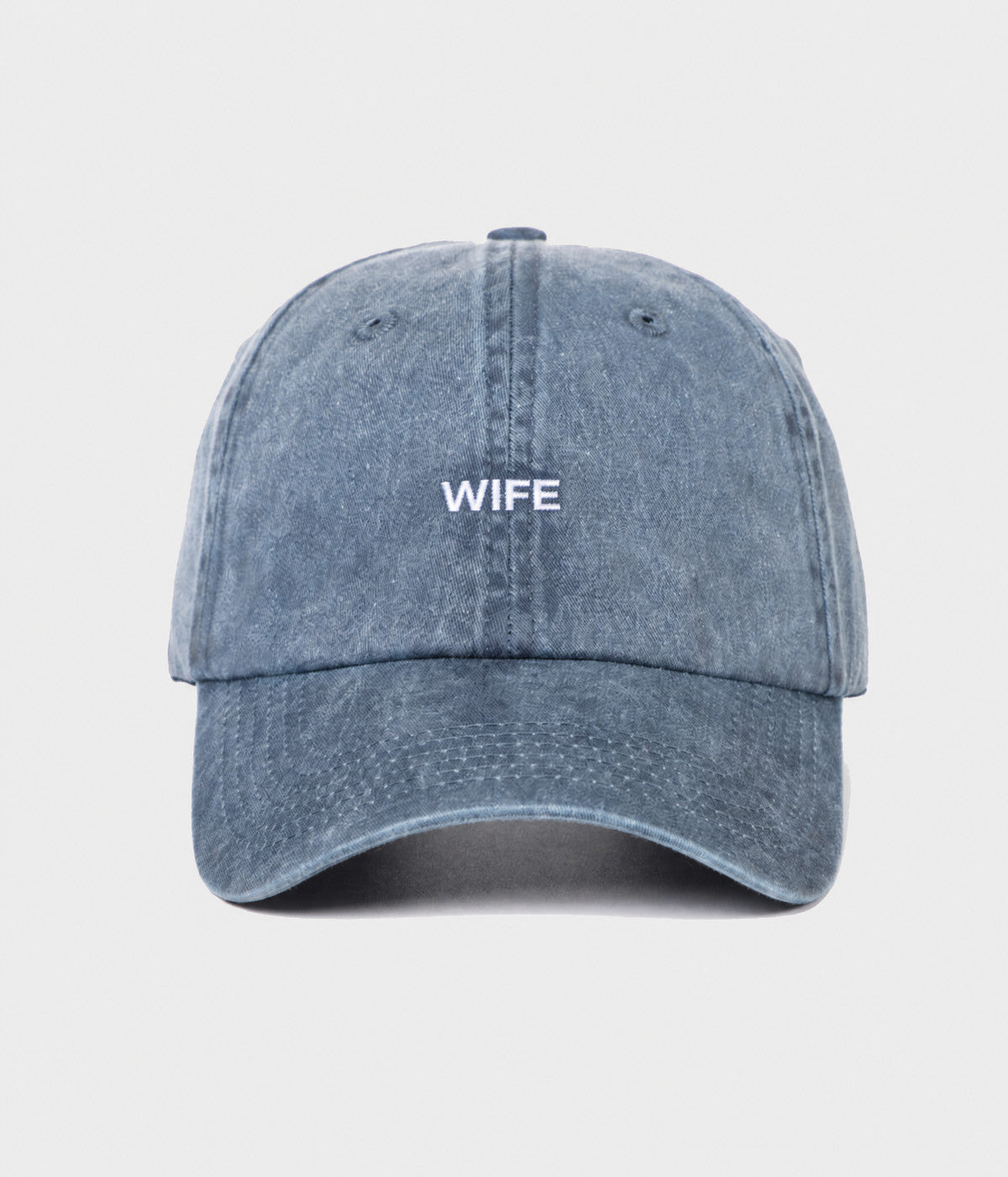 WASHED WIFE. washed cotton dad cap in NAVY, front view