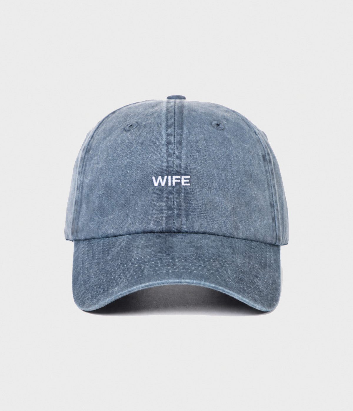 WASHED WIFE. washed cotton dad cap in NAVY, front view