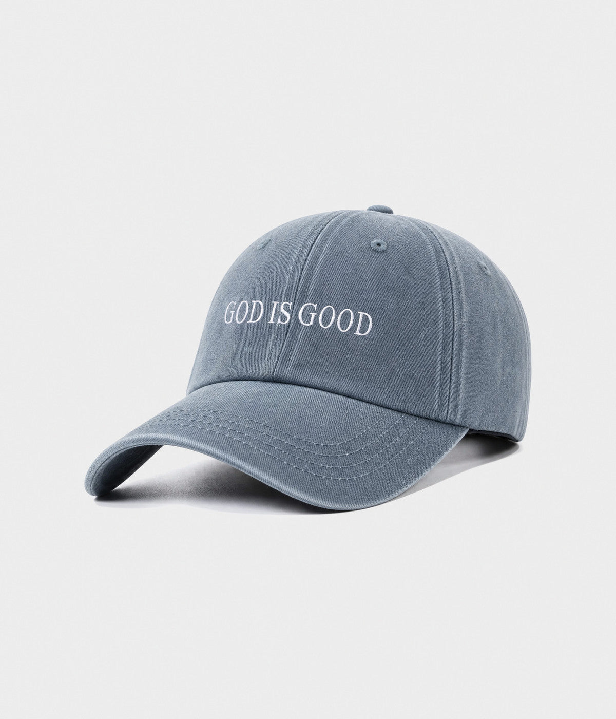 GOD IS GOOD. washed cotton cap in blue, side view
