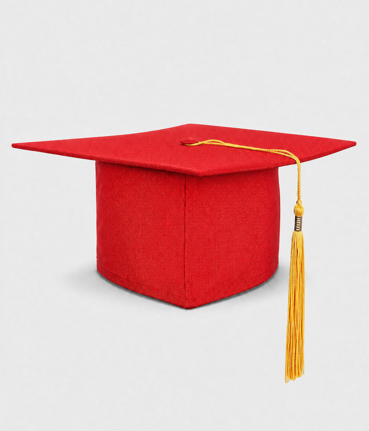 GRADUATION CAP. red mortarboard with gold tassel, front view