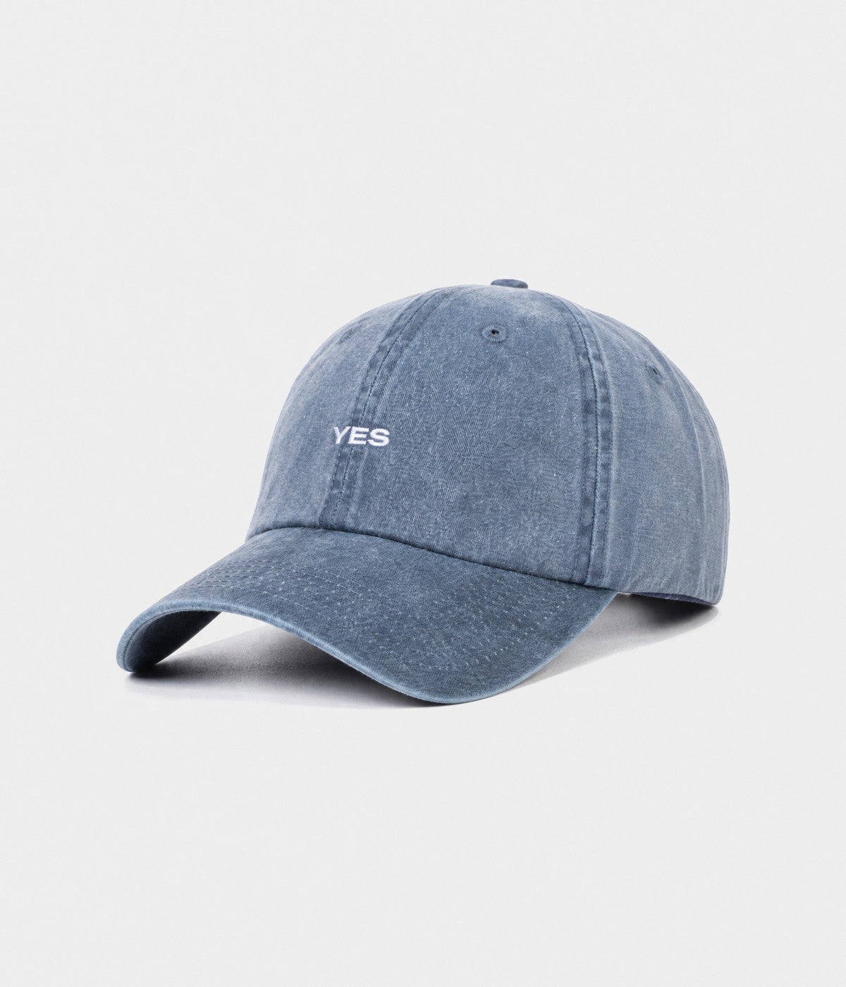 WASHED YES. washed cotton dad cap in NAVY, side view