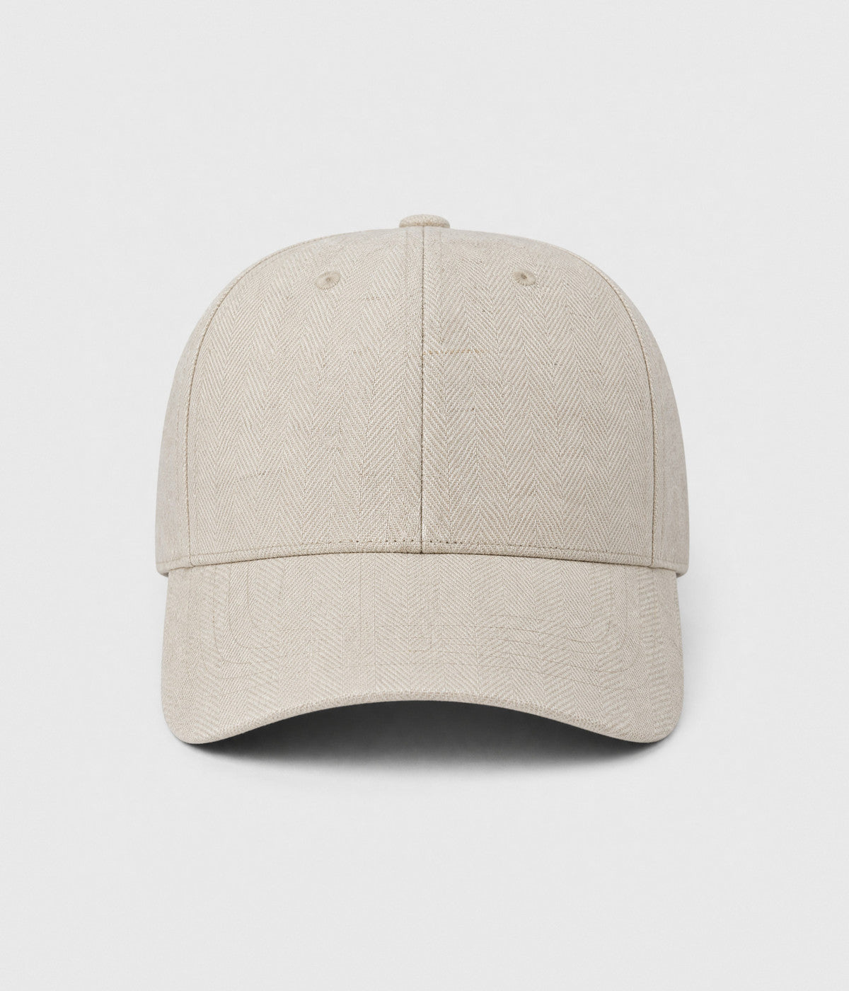 HERRINGBONE LINEN CAP. herringbone linen cap in beige, front view