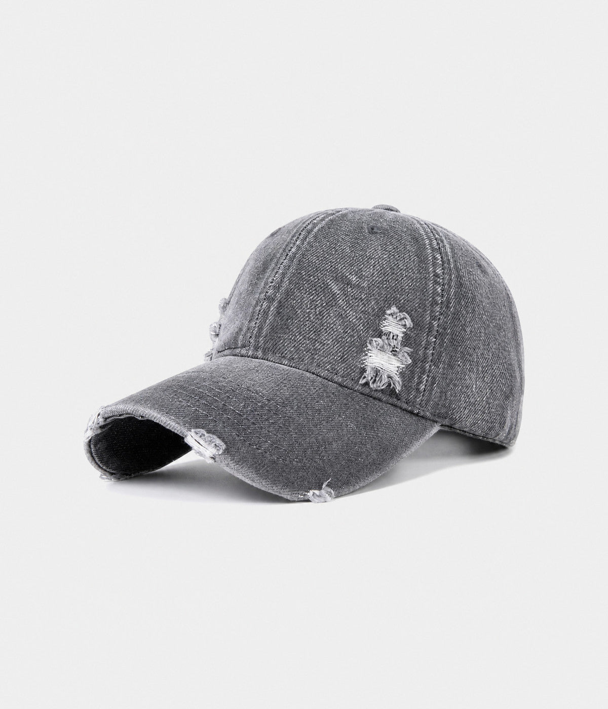 RIPPED DENIM. washed cotton denim cap in dark gray, side view