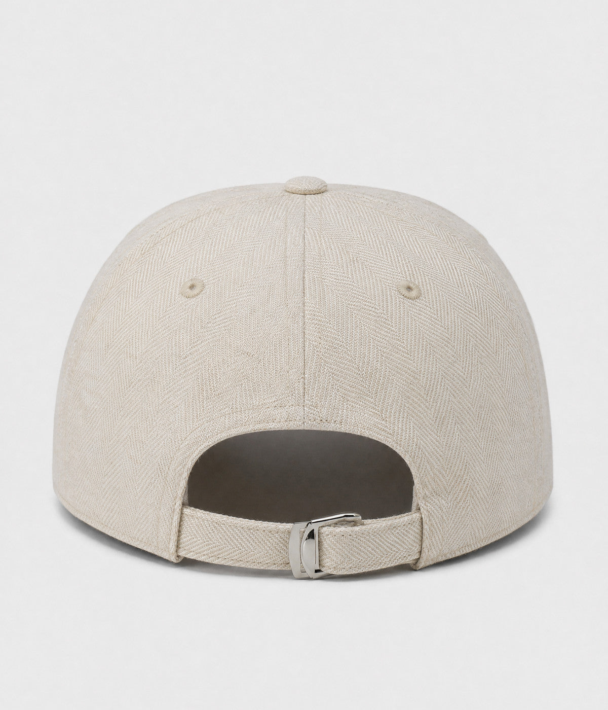 HERRINGBONE LINEN CAP. herringbone linen cap in beige, back view