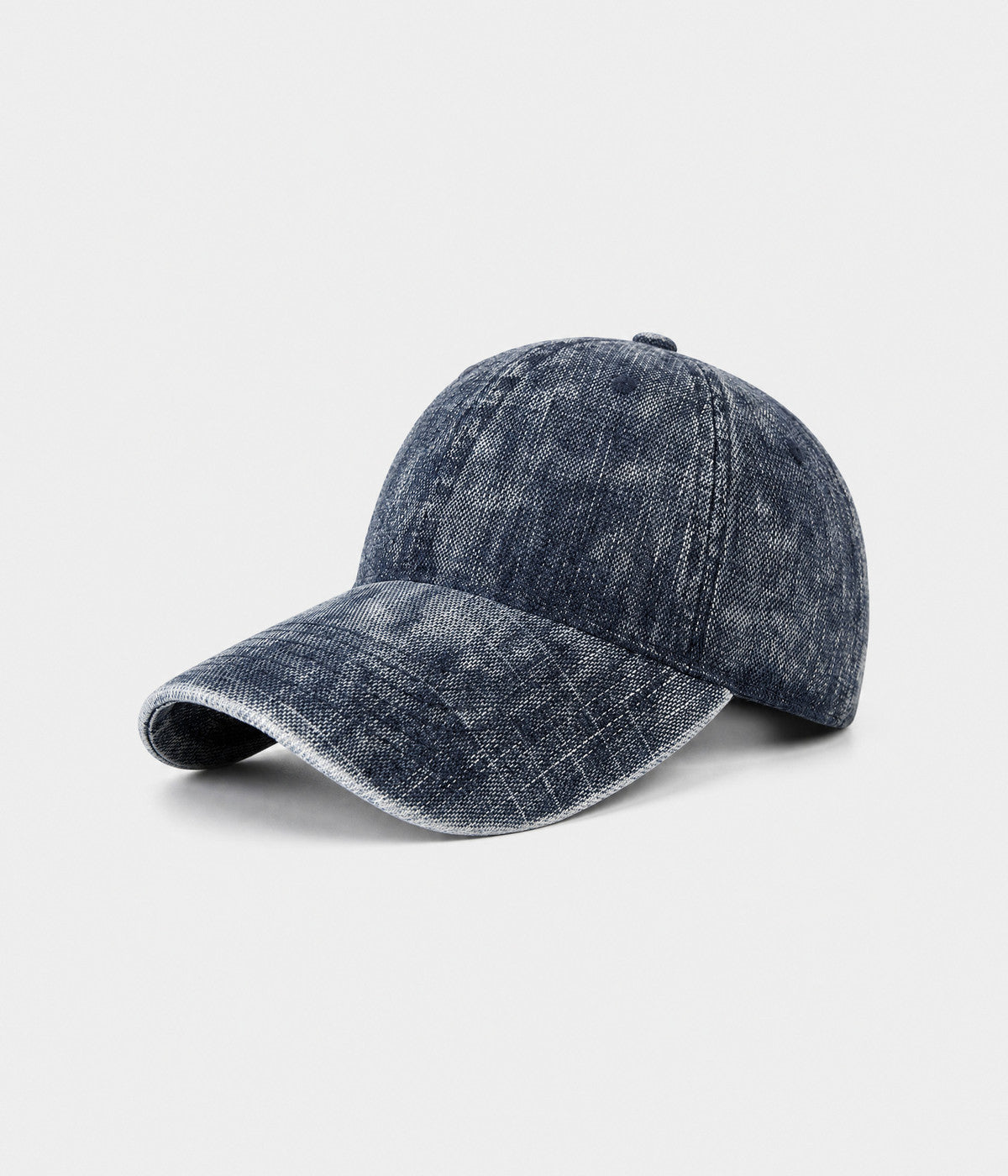 DENIM FADE. washed cotton cap in navy, side view