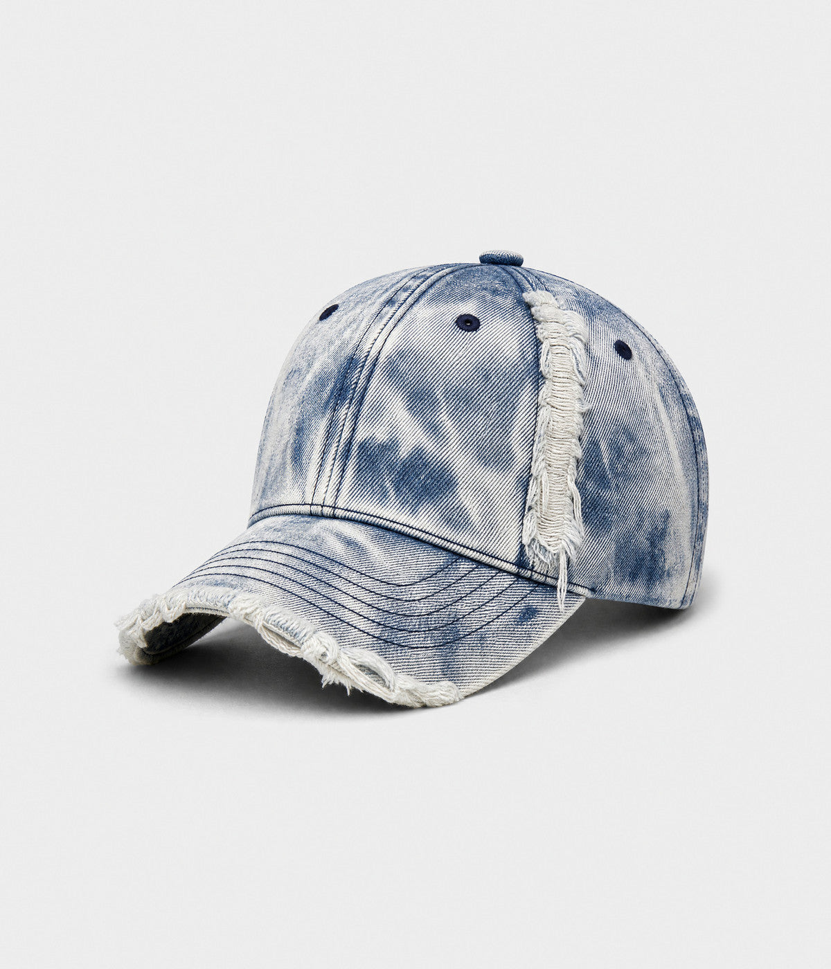 SNOW WASH DENIM. acid-washed denim cap in blue, side view