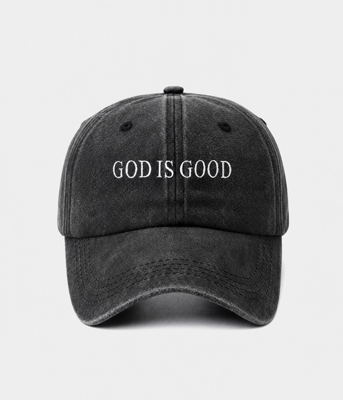 GOD IS GOOD. washed cotton cap in black, front view