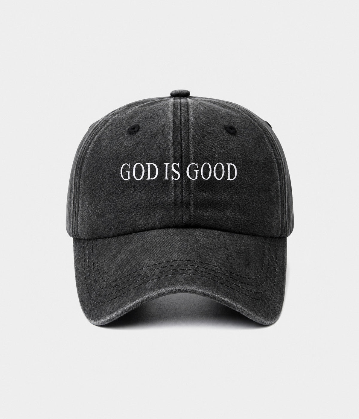 GOD IS GOOD. washed cotton cap in black, front view